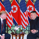 Listening closely to the dear leader.